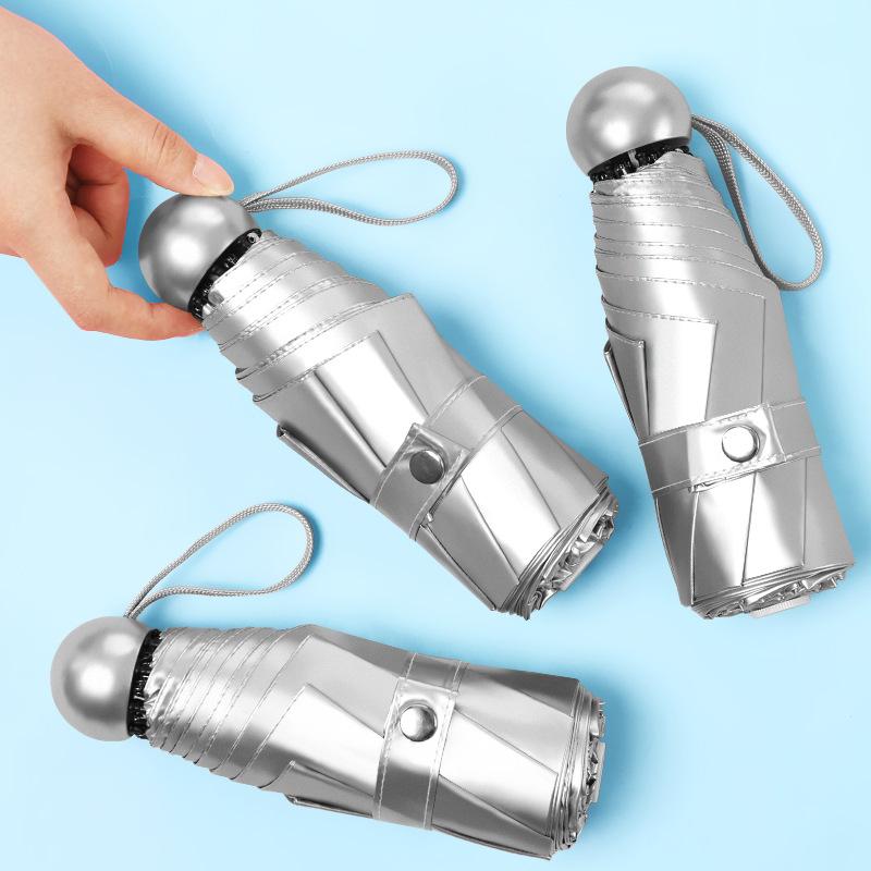Titanium silver glue parasol folding umbrella vinyl sunscreen 50% off 8 bone mini sun umbrella