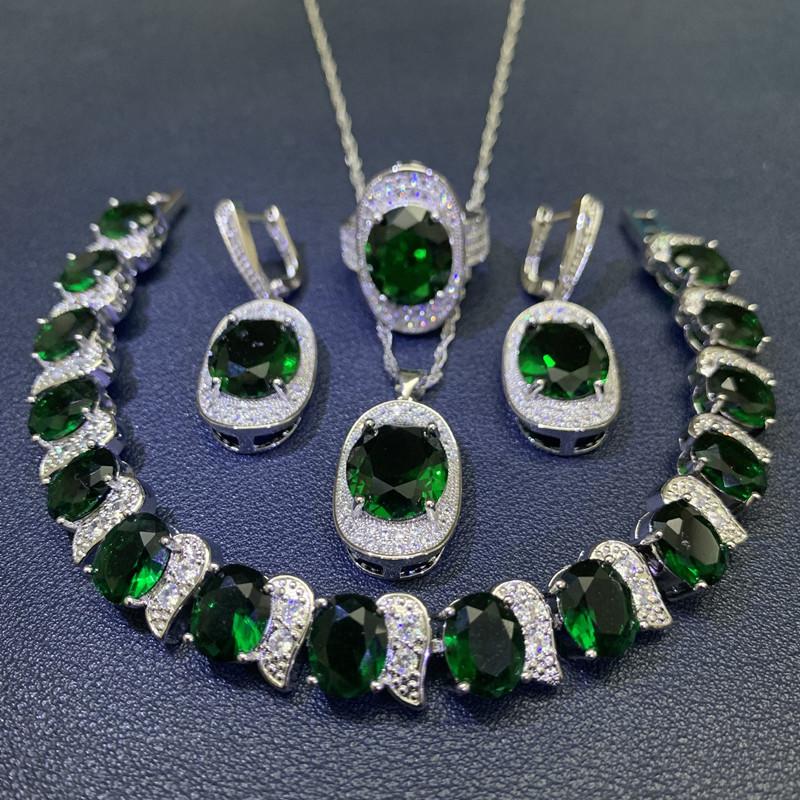 Čtyřdílná sada vykládaná světle modrým zirkonem Dámské náušnice náramek prsten Módní párty svatba