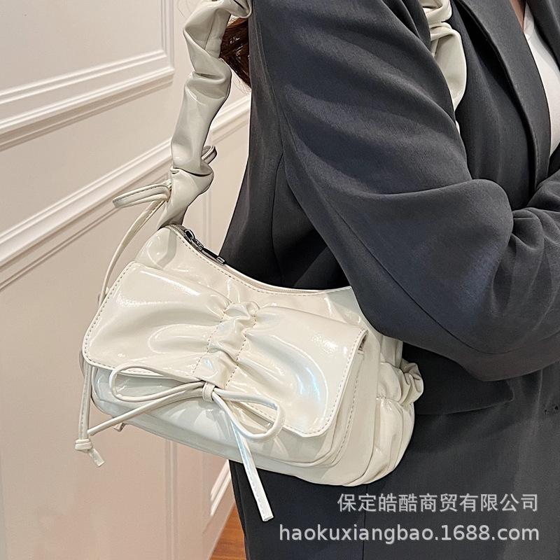 Bag women 2025 new design sense niche fashion messenger bag popular this year pleated armpit small square bag