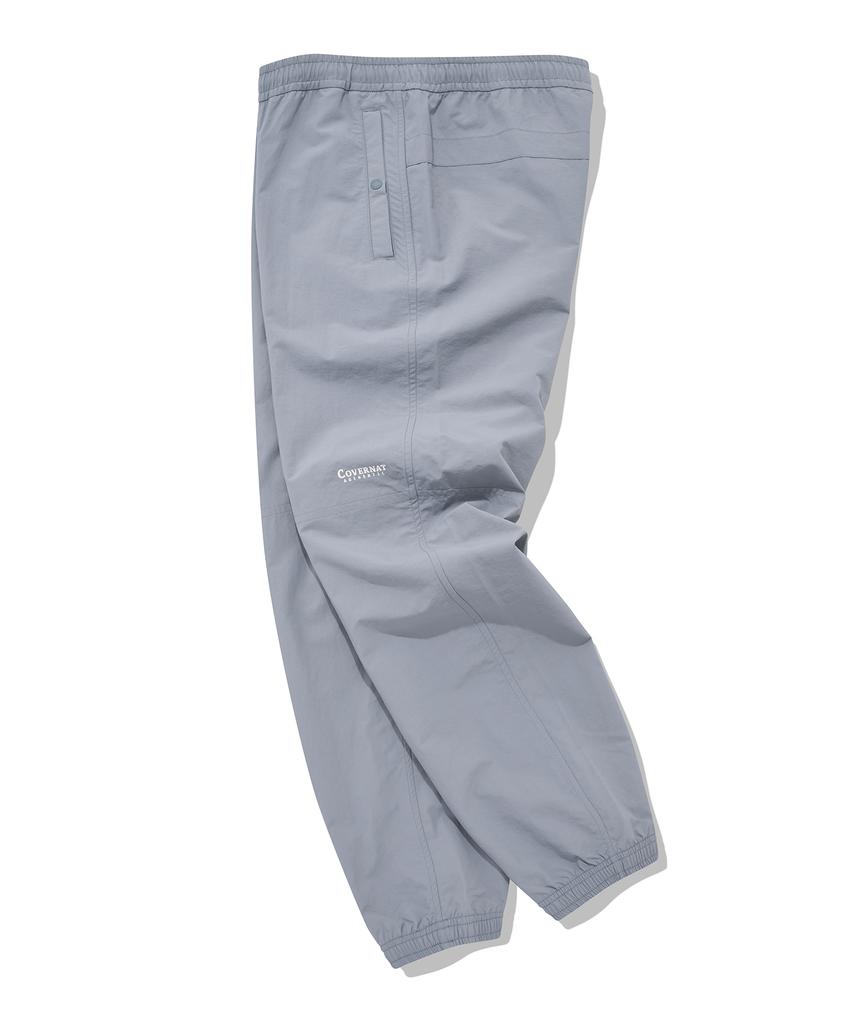 COVERNAT Windbreaker Jogger Pants Light Blue