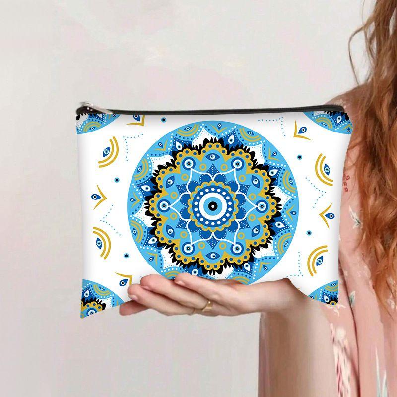 Printed devil's Eye cosmetic bag, travel storage bag, high-value women's clutch bag, wash bag