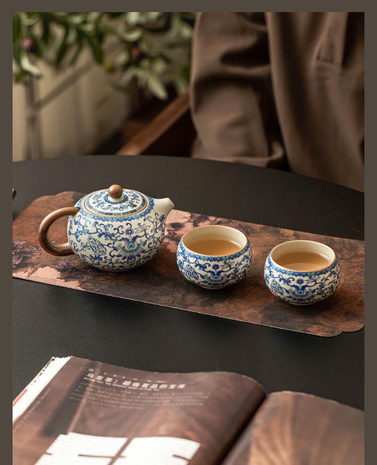 Blue & White Ru Kiln Ceramic Teapot featuring Intertwined Lotus Design – Xishi Style, Perfect for Home Tea Brewing, High-End Chinese Tea Set.