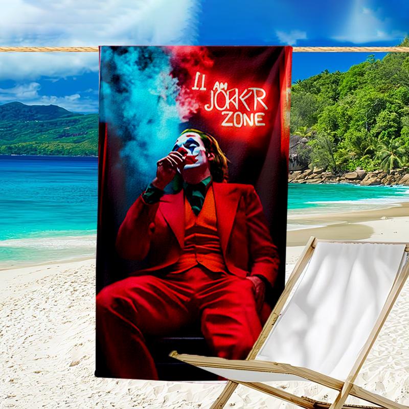 proof beach towel with a Joker character pattern - soft,absorbent,quick-drying,machine washable - perfect for swimming,camping,bathing