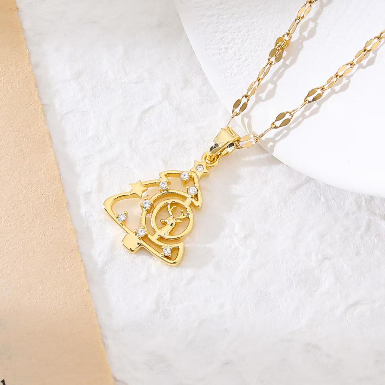

Popular Christmas Series Necklaces: Santa Claus, Peace Tree, Holiday Element Micro-Paved Drip Oil Pendant
