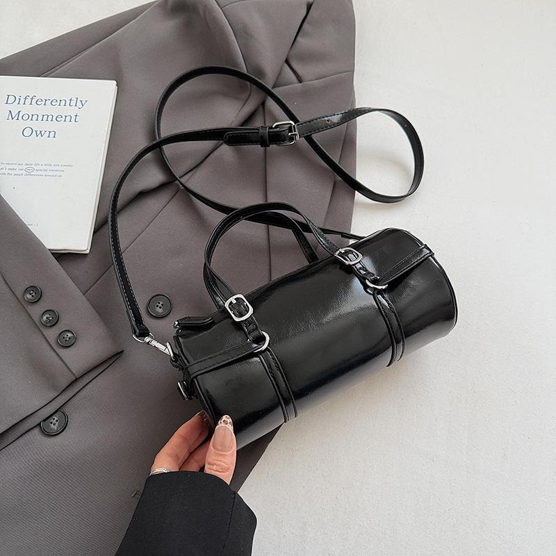 

Модная ручная сумка-боулинг женская 2025 осень новая простая нишевая трендовая сумка-мессенджер на одно плечо для通勤