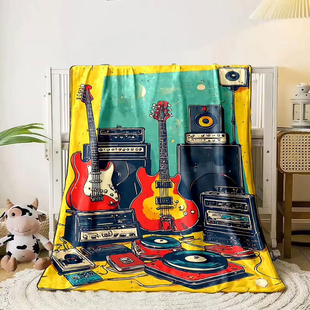 

A colorful arrangement of guitars, amplifiers, speakers, and turntables. for all seasons blanket lunch break throw gift 80cm x 120cm