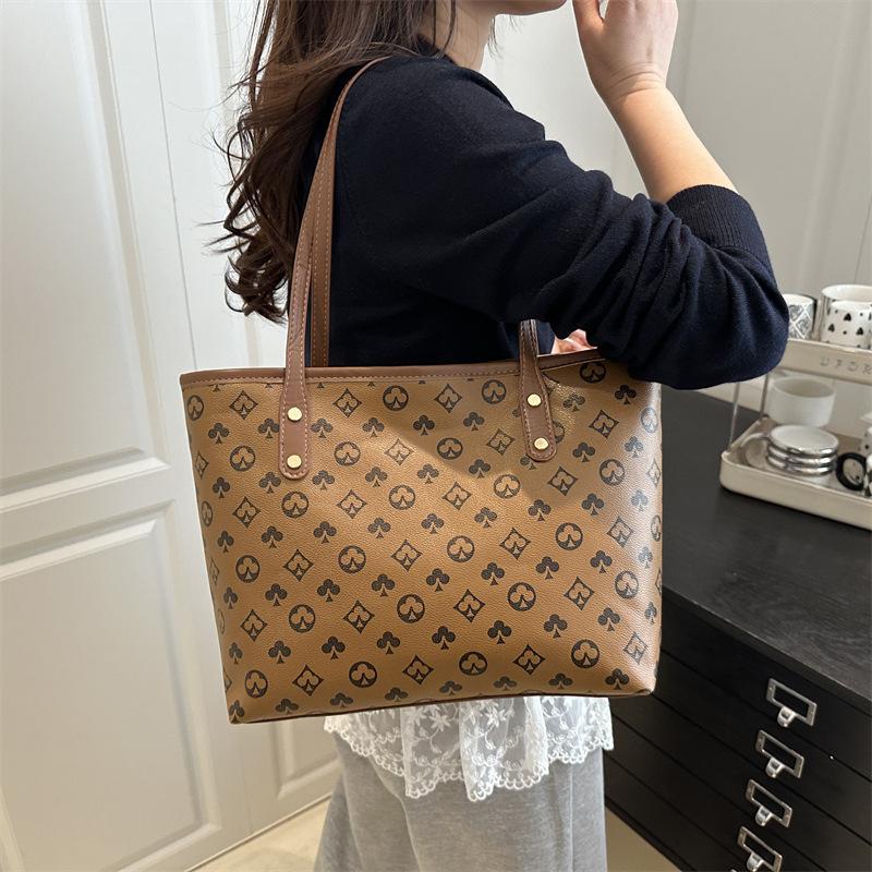 Neue, geräumige Damenhandtasche für den Arbeitsweg – vielseitig einsetzbar und elegant – im europäischen Stil.