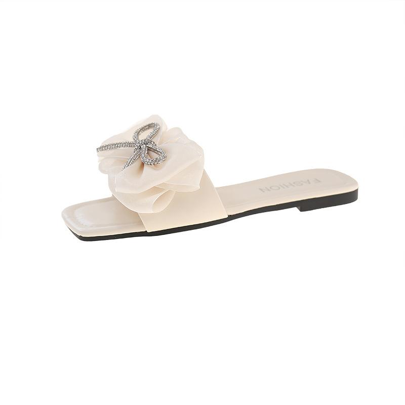 2025 summer new Internet celebrity bow flat bottom one word cool slippers women's shoes wear fashion versatile ins tide