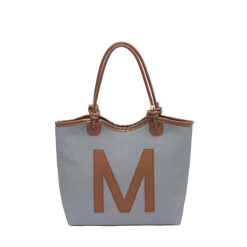 

New niche design trend large capacity shoulder armpit bag versatile casual hand bag сірий колір