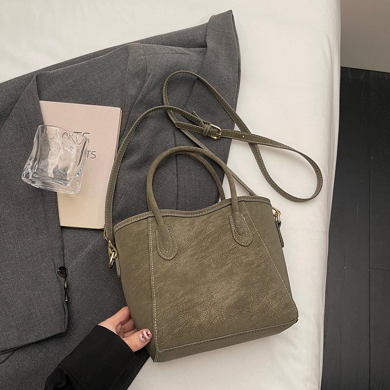 

High value simple handbag bag women s winter fashion messenger bag retro commuter bucket bag