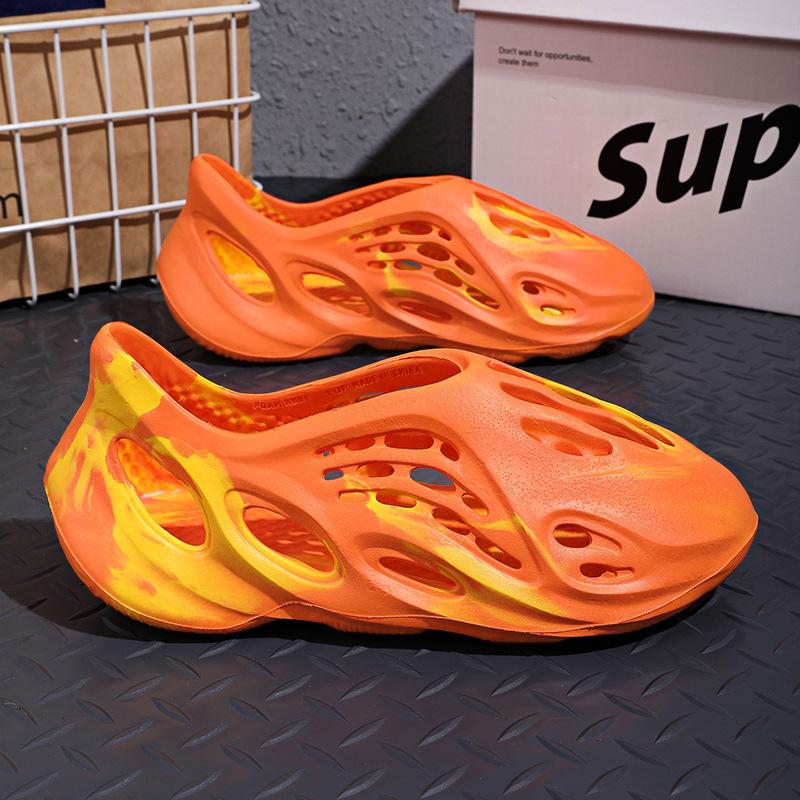 Große Größe Camouflage Kokosnussloch Schuhe Herren Sommer 2025 Neu Hohl Tasche Kopf Graffiti Sandalen Rutschfest Strand