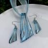 Trendy Blue Glass Ribbon Pendant Necklace & Earring Set - Perfect Seaside Vacation Accessory.