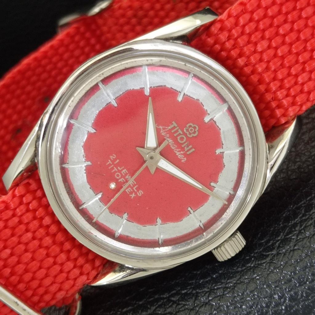 

ВИНТАЖНЫЕ ЧАСЫ TITONI AIRMASTER TITOFLEX ШВЕЙЦАРСКИЕ МУЖСКИЕ С ЦИФЕРБЛАТОМ КРАСНОГО ЦВЕТА a700331-5 R202-a700331