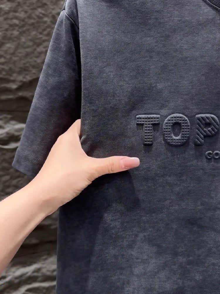 2025 Letní Trendy Minimalistické Batikované Embosované Tričko s Kulatým Výstřihem - Všestranný Ležérní Design s Polovičním Rukávem