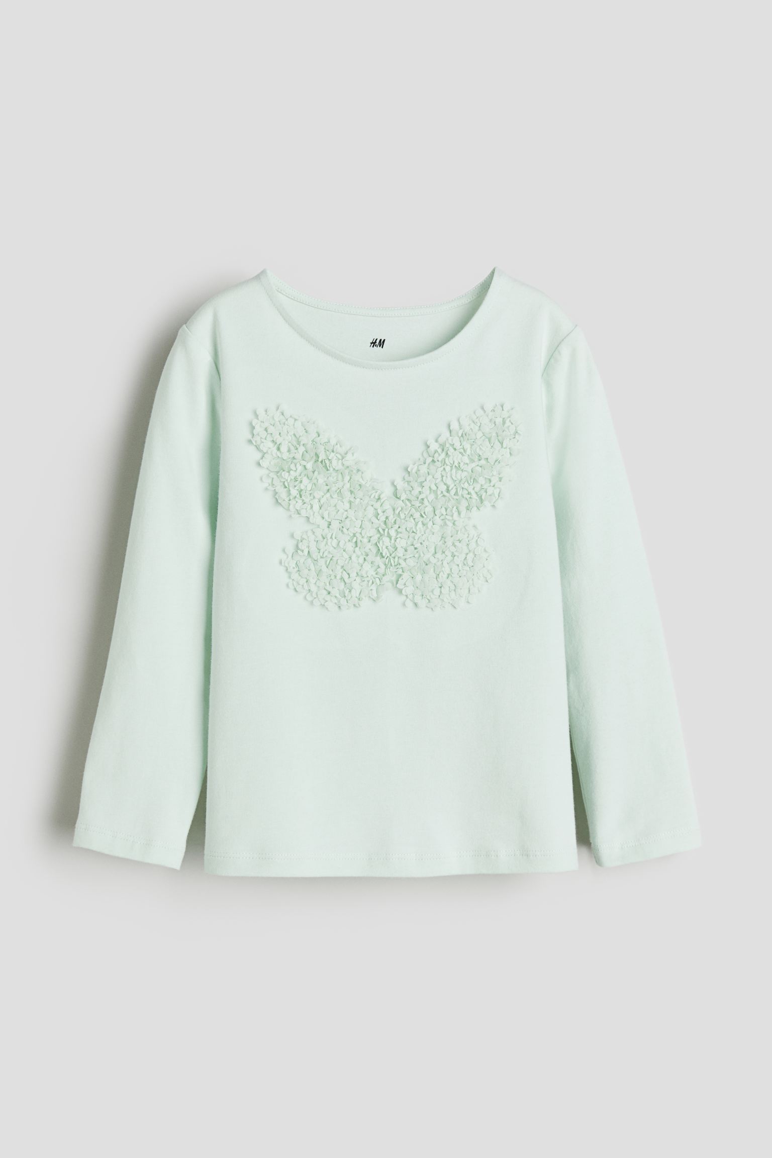 

Топ из джерси с аппликацией