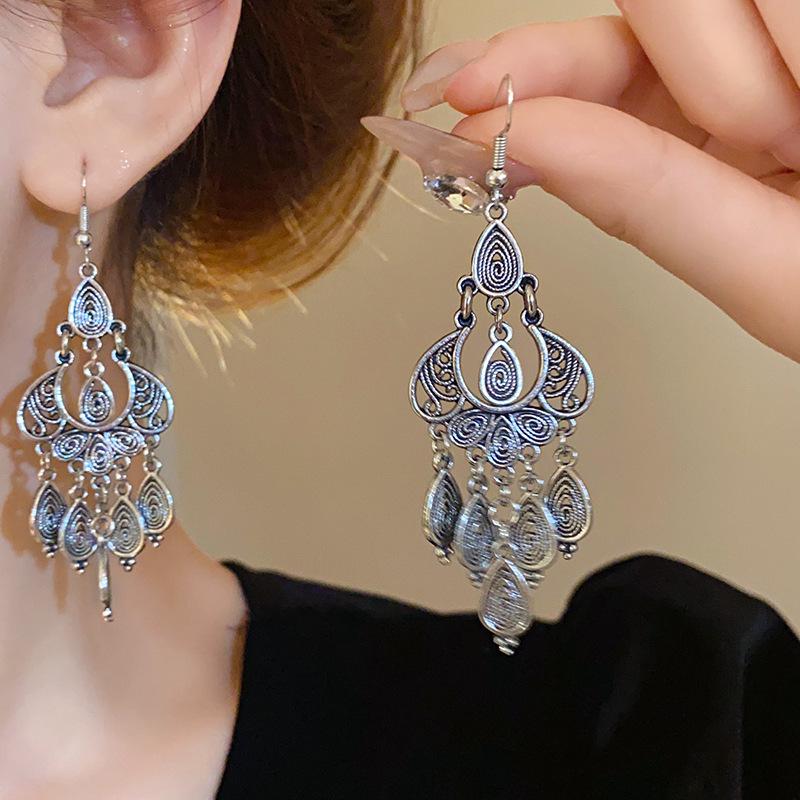 

Богемные серьги с кисточками: Этнический стиль, Универсальные дорожные аксессуары