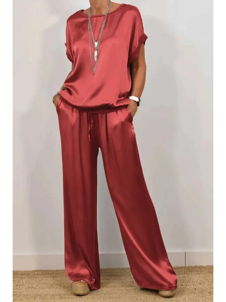Set Top Bianco a Vestibilità Rilassata e Pantaloni a Gamba Larga a Vita Alta