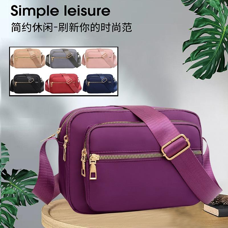 New Oxford cloth bag women's bag lightweight anti-splashing shoulder messenger bag mother bag mobile phone change cashier bag