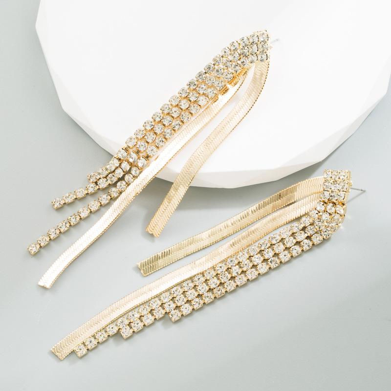 Boucles d'oreilles pendantes pour femmes Alliage Créatif Pompons Électroplaqué Personnalité Tempérament Boucles d'oreilles Premium