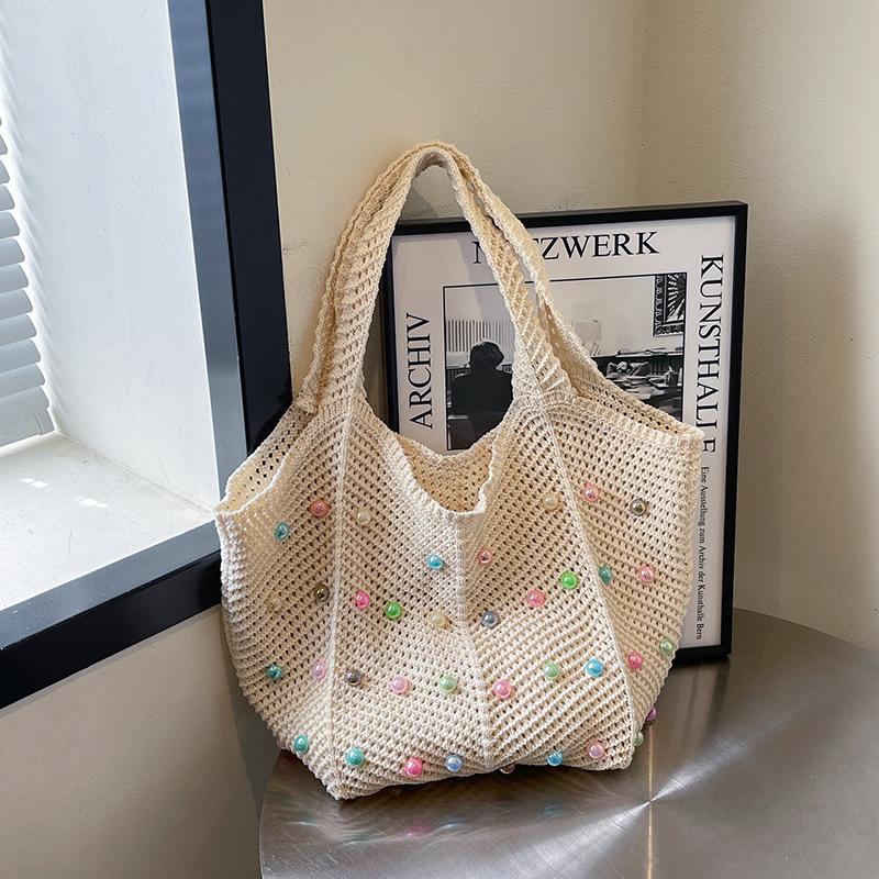 Fashion woven portable tote bag women's bag summer hollow foreign style shoulder bag casual armpit bag
