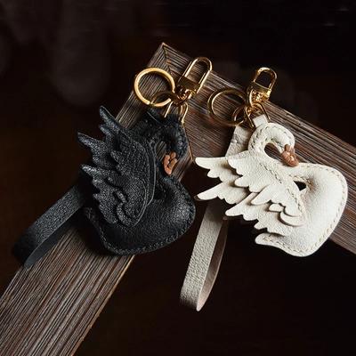 Handgemaakte tas van echt leer met schattige zwaan, sleutelhanger, autosleutelring, accessoires voor damestassen, doe-het-zelf-accessoires, cadeaus voor stellen