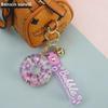 Luminous Oil-Filled Donut Quicksand Keychain: Exquisite Car Pendant & Bag Accessory, Ideal for Gifts.