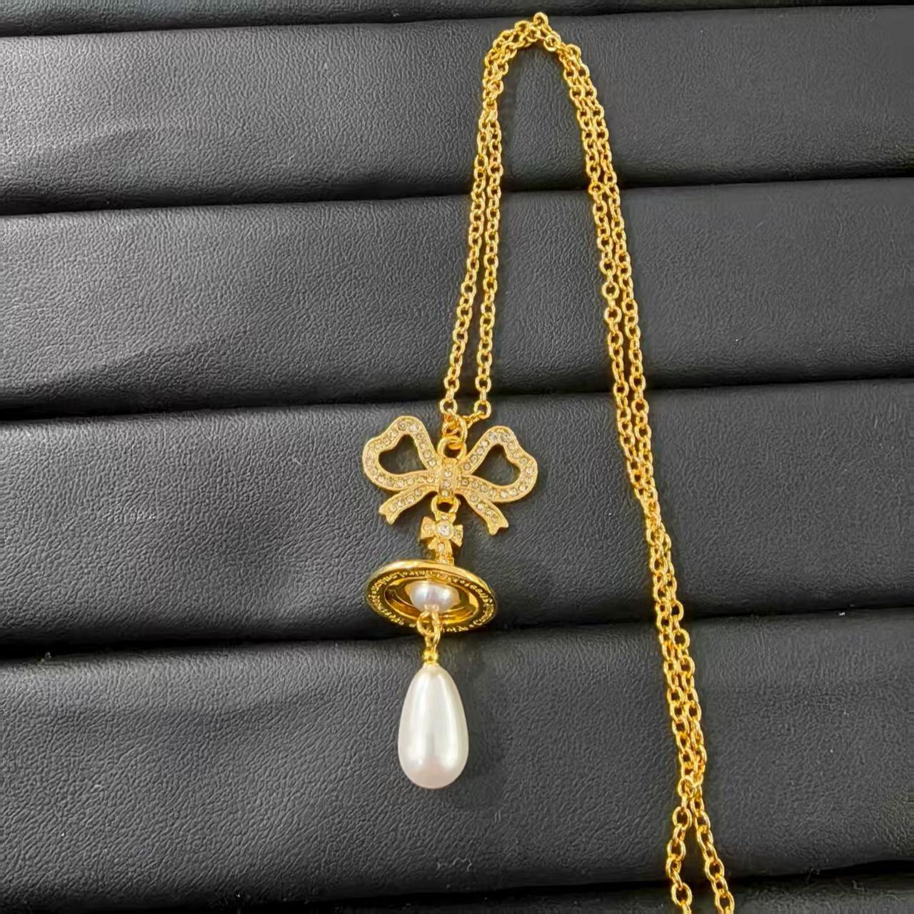 

Empress Dowager Pearl Jewelry Set: Teardrop Necklace, Bracelet & Earrings