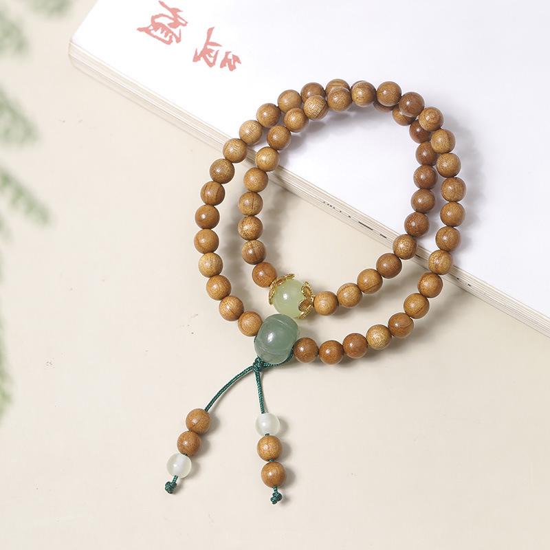 Armband aus goldenem Sandelholzperlen mit Quaste: Unisex Multi-Wrap Rosenkranz im alten chinesischen Stil.