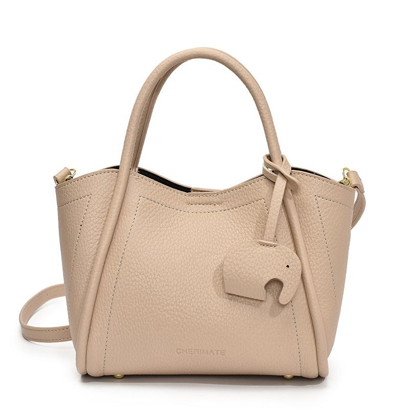 

Spring lychee pattern texture simple portable vegetable basket bag Korean leisure women commuter messenger mother bag