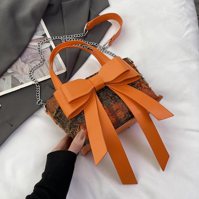 

Large capacity bow bag women s 2024 spring new sweet shoulder bag simple student class commuter bag women помаранчевий