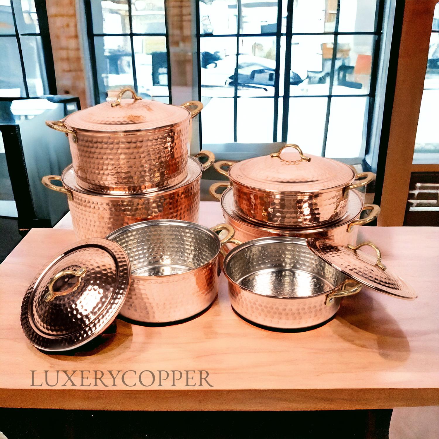 

Набор посуды из шести предметов из кованой меди