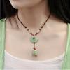 GEMCHIC Women's Vintage Chinese Style Green Jade Flower Pendant Necklace with Tassel Beads Long Chain Ethnic Jewelry