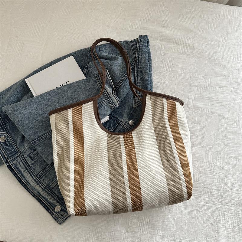 

Сумка-тоут с контрастными полосками для переноски вручную, женская, 2025 года, новая, простая, повседневная, большая, вместительная, модная, универсальная, женская сумка