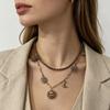 Vintage Double-Layer Sun & Moon Face Sweater Necklace for Women