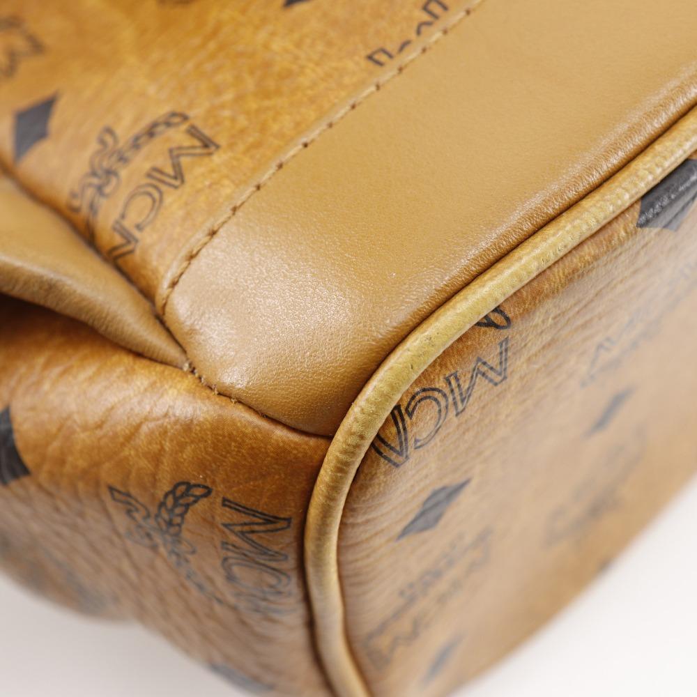 MCM Logogram Rucksack Tagesrucksack MMK2AVE20 Kleine Nieten Braun PVC Damen Gebraucht