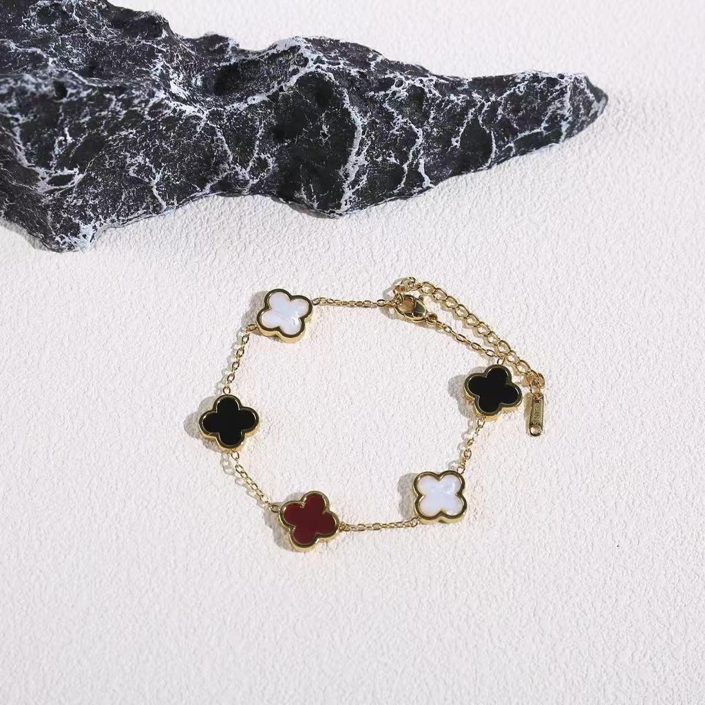 Elegant Titanium Steel Four-Leaf Clover Bracelet with Five-Petal Design