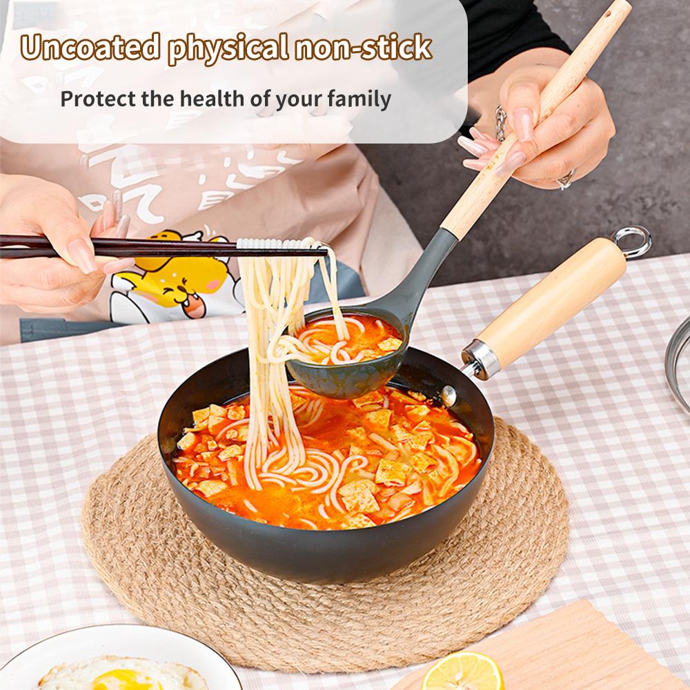 A deep circular, stir fry iron pan, uncoated and non stick pan, compatible with induction cookers