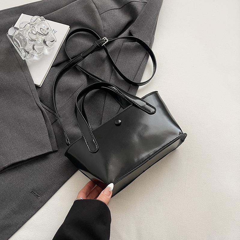 

Стильная и простая маленькая женская летняя новая портативная сумка-ведро, универсальная на плечо, сумка-мессенджер