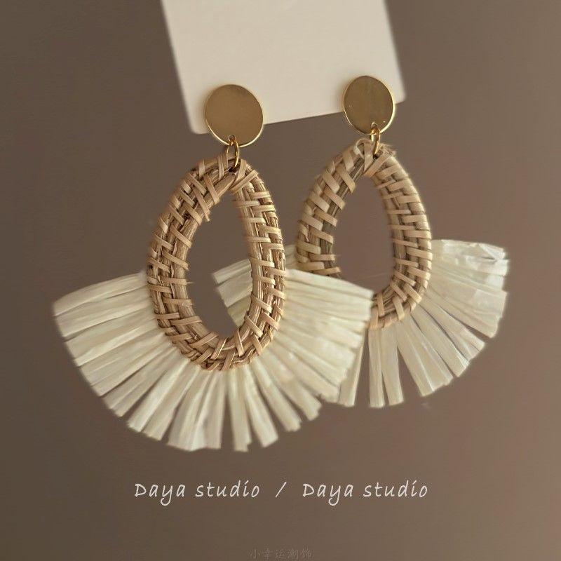 

Bohemian fan-shaped woven stud earrings women s unique design sense holiday style exaggerated earrings versatile niche earrings