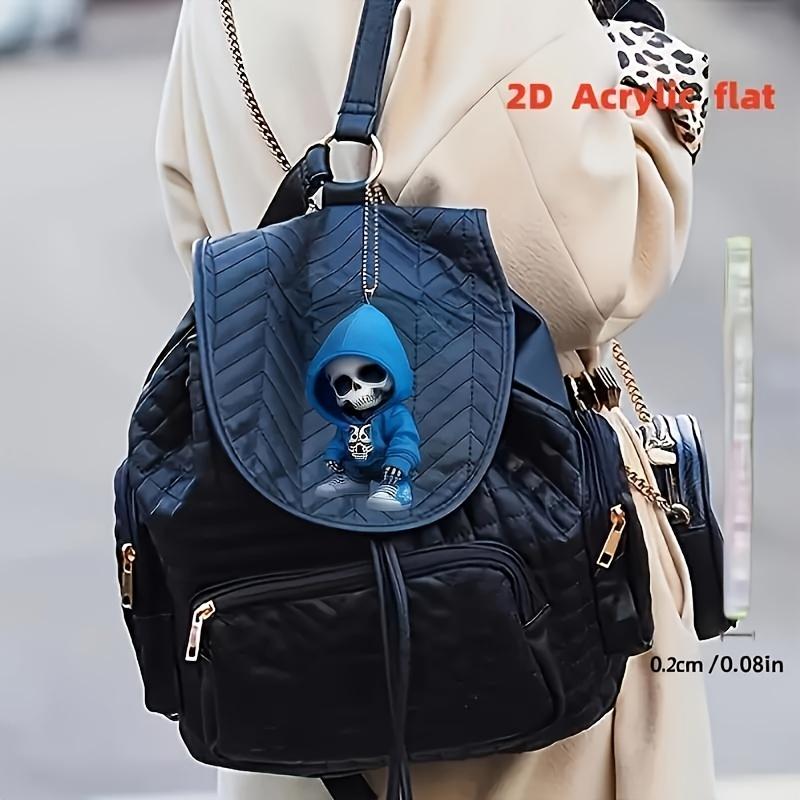 A Stylish 2D Skull Pendant with A Blue Hoodie Design, Suitable for Car Rearview Mirrors, Bags, and Home Decor