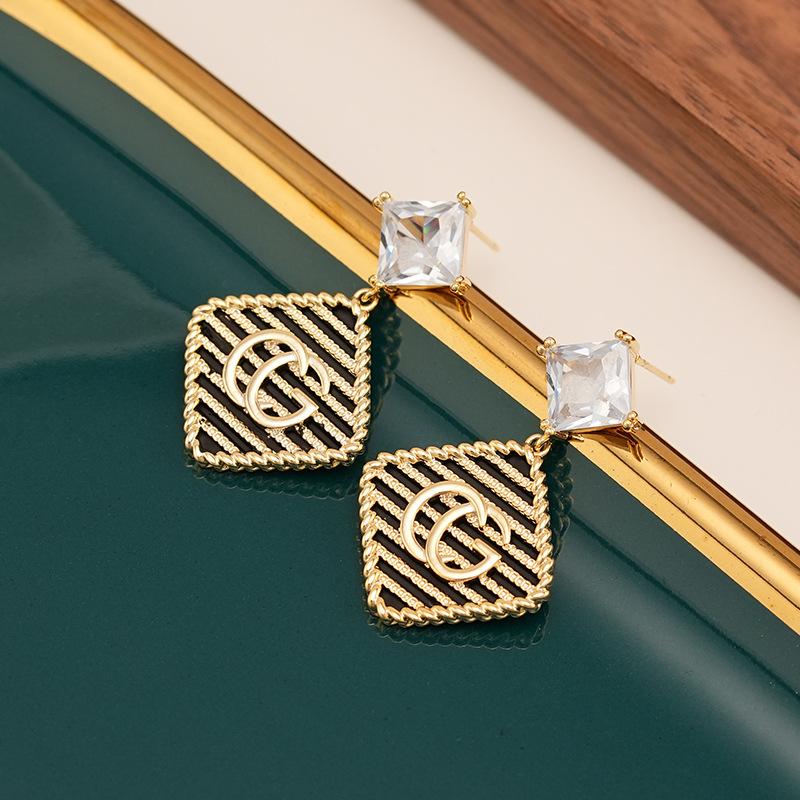 

Модные серьги-ромбы от известных брендов, роскошные серьги с черным узором из циркония, женские серьги высокого класса. 14k