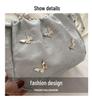 High-End Women's Metallic Bow Bucket Bag - Autumn 2024 Niche Fashion Drawstring Style