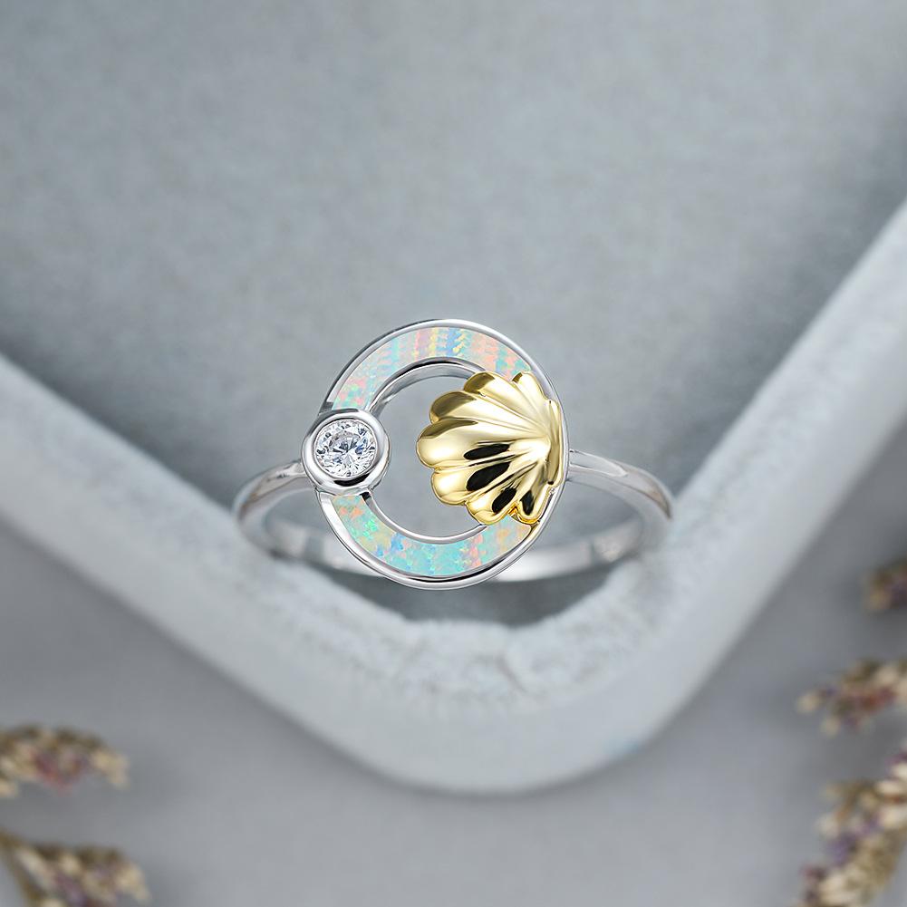 

Женское универсальное кольцо из золотой раковины с бриллиантами и белым кругом No. 10