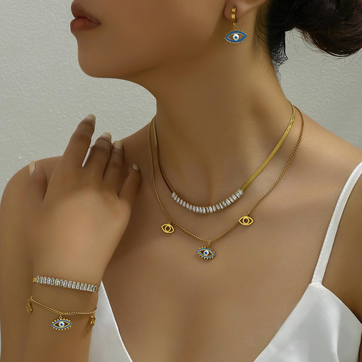 

Трехслойный нишевый набор длинных ожерелий, подвеска в виде глаза бирюзово-голубого цвета, серьги, браслет, инкрустированные цирконом.