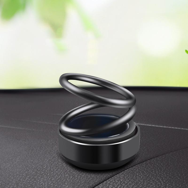 New Solar-Powered Rotating Car Perfume Ornament