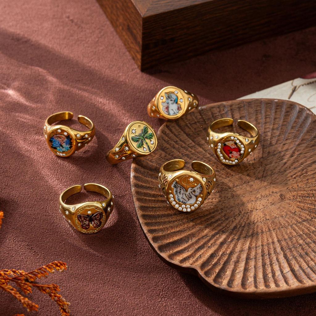 Acciaio al Titanio Moda Luce Lusso Sigillo Dipinto Anello Statement Farfalla Amore Coniglio Fiore Design Personalità Senso del Design Oro 18K