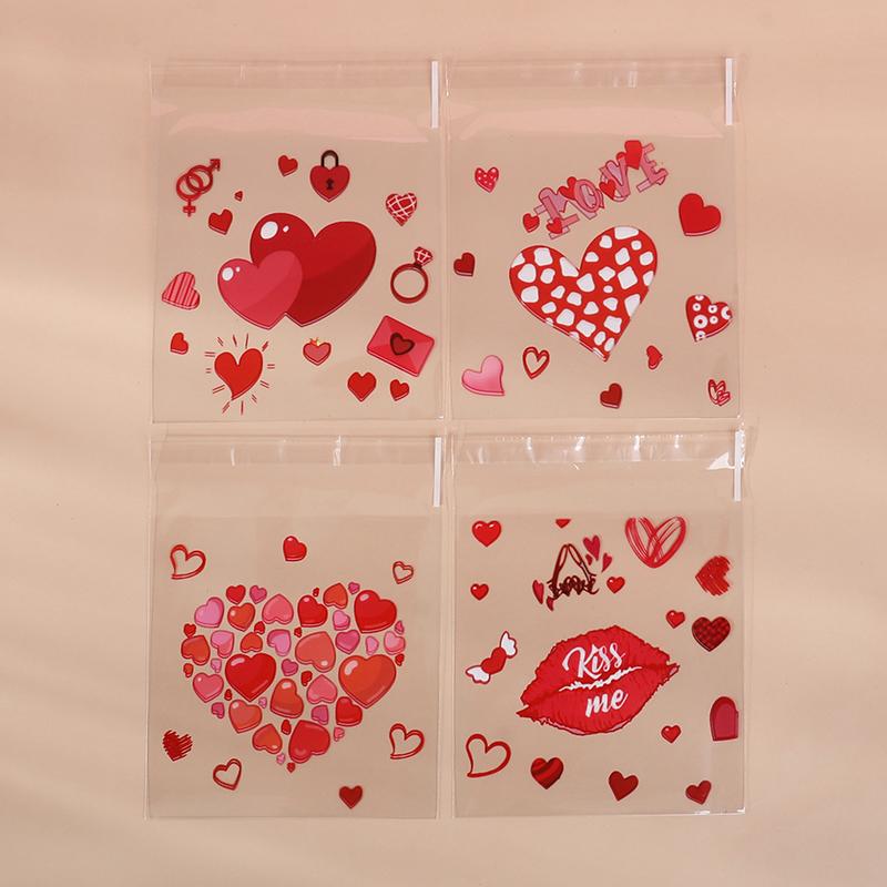 

100pcs Valentine s Day Candy Cookie Packaging Bag Love Heart Plastic OPP Gift Bag Valentines Day Party Decoration Supplies 2025 10x10cm