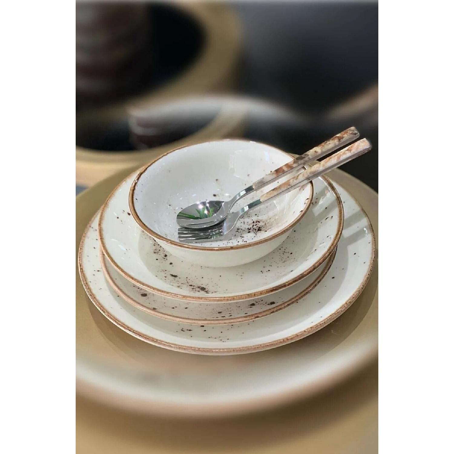 

Обеденный набор Reactive Cream из 48 предметов на 12 персон