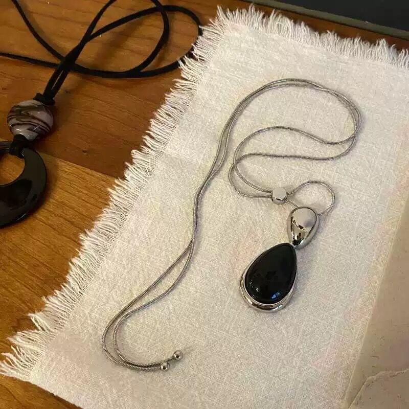 

Нишевый дизайн черный агат металлический сращивание нерегулярный кулон ожерелье длинный универсальный овальный обсидиан свитер цепь