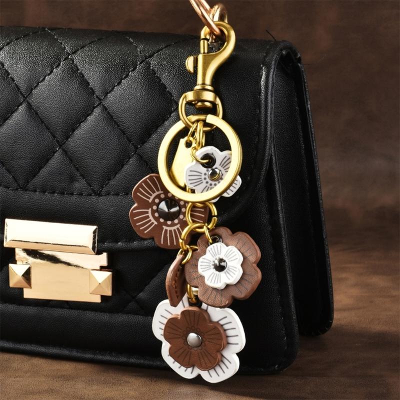 Retro Elegancki Brelok z Kwiatem Zawieszka do Torby Brelok do Kluczy Samochodowych Akcesorium do Telefonu Komórkowego Tekstura PU i Stopu Odpowiedni dla Kobiet